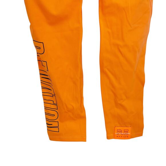 P.E Nation Uprise Legging in Nectarine SIze XS NWT Yoga Pilates Princess - Picture 4 of 12
